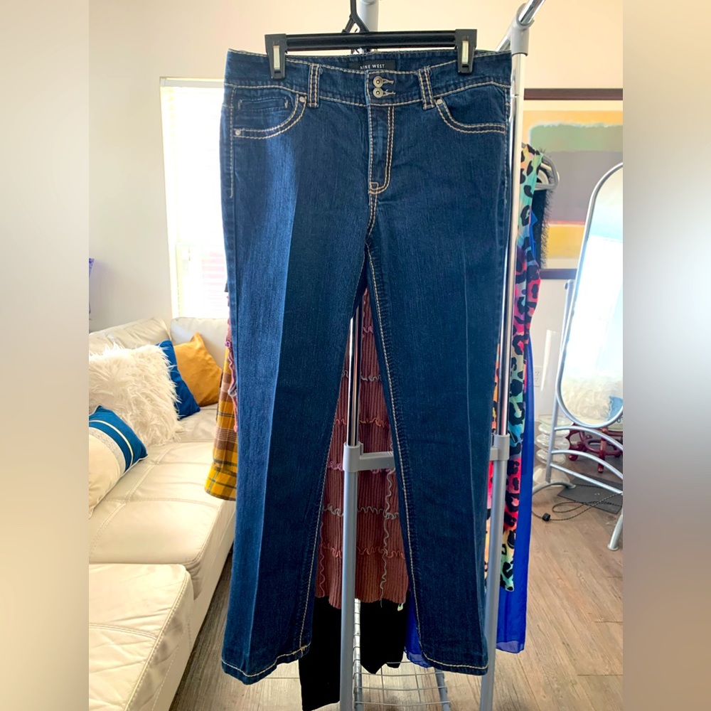 Nine West, boot cut jeans with rhinestone back pocket details, size 10